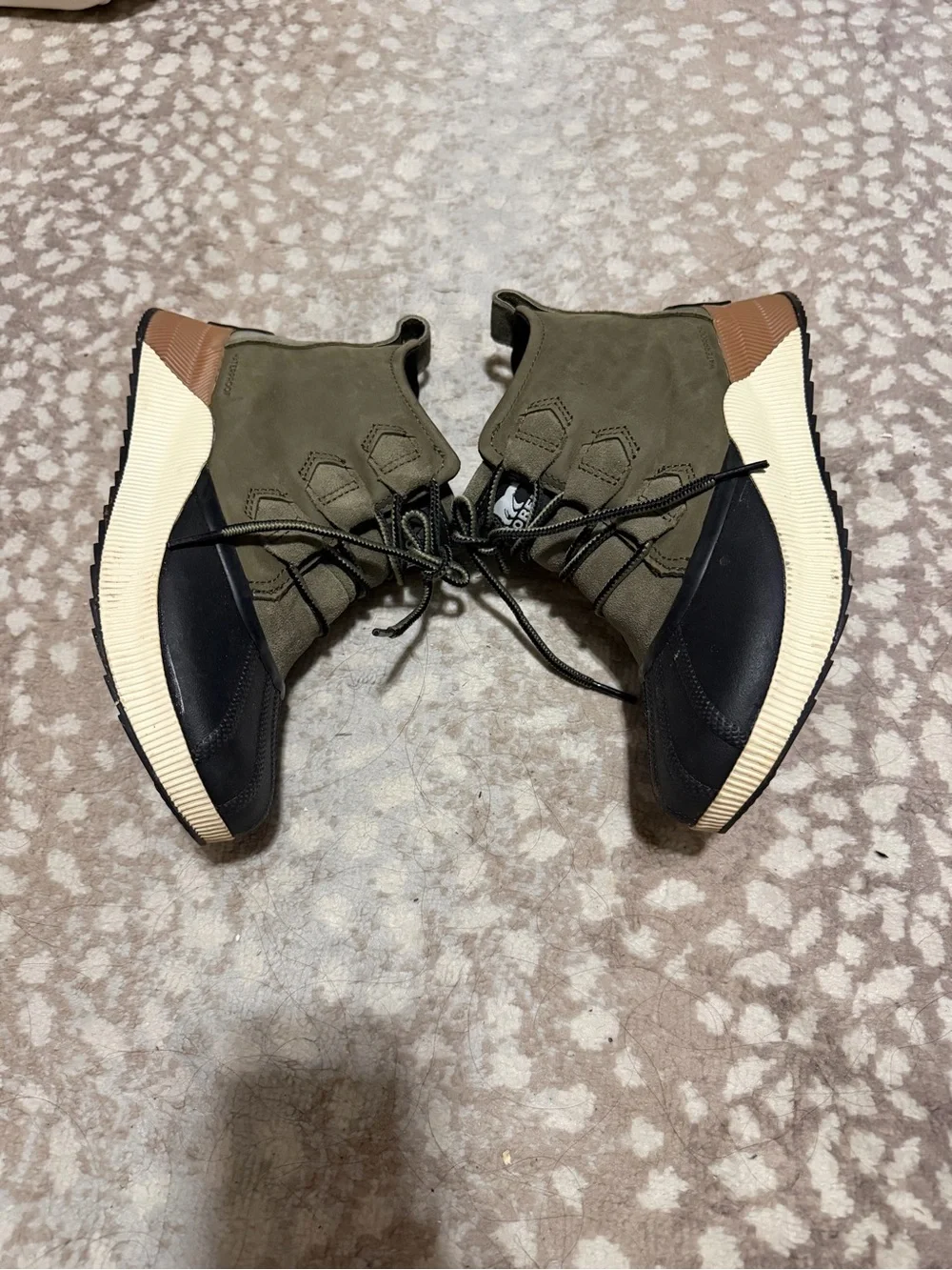 Sorel Women’s Out N About olive green boots.
